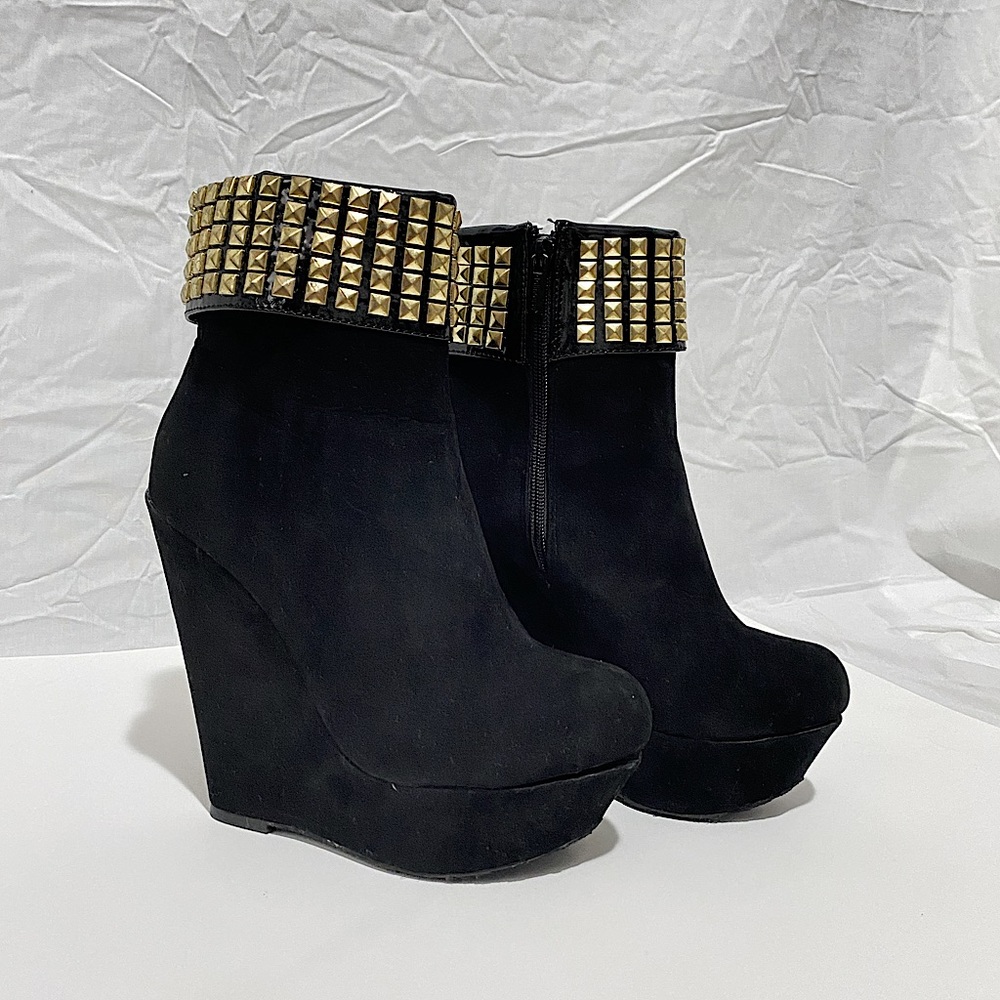 Black velvet heeled boots. With fake leather strip and golden gems. Size 7.